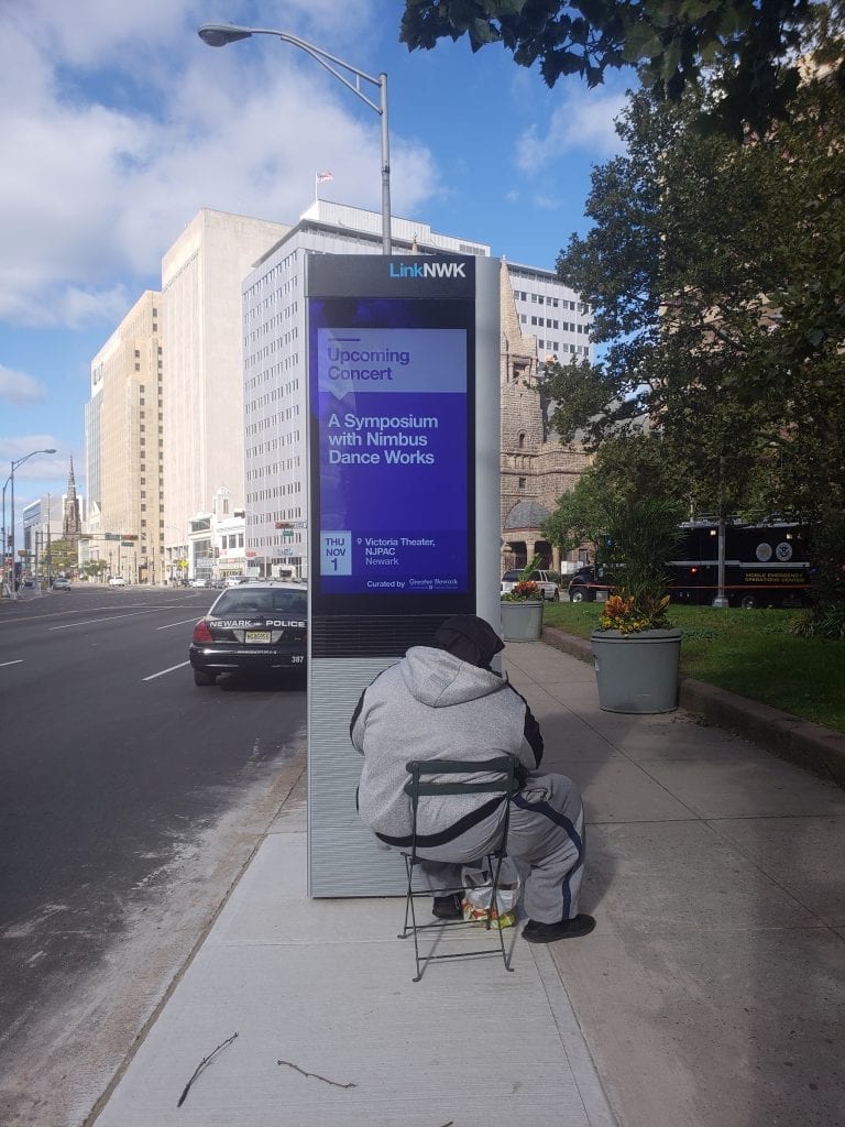 LinkNWK: Homeless Man Charging His Phone