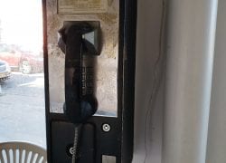 No-Name Payphone at a No-Name Laundromat