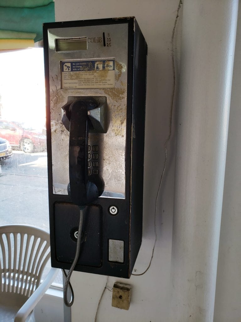 Abandoned Laundromat Payphone in Elmhurst, Queens