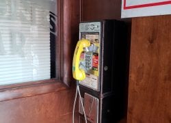 Abandoned Verizon Paypone at Pasiones Sports Bar in Woodside