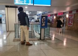 Dude Talking On One Of Penn Station’s 14 Remaining Payphones