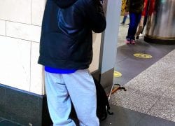 Payphone User at Penn Station Today