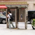 Dude Using a Midtown Payphone. July, 2011.