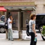 Dude Using a Midtown Payphone. July, 2011.