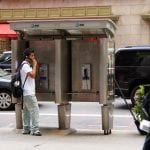 Dude Using a Midtown Payphone. July, 2011.