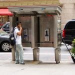 Dude Using a Midtown Payphone. July, 2011.