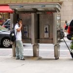 Dude Using a Midtown Payphone. July, 2011.