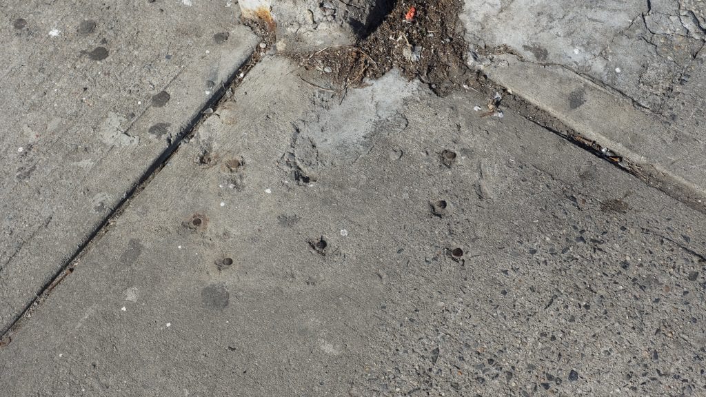 Metal Spikes Where a Payphone Used To Be