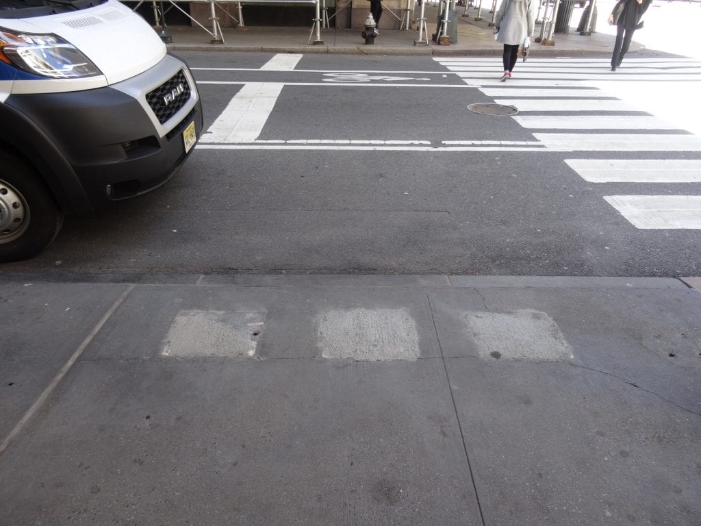 Square Concrete Smears Where Three Payphones Used To Be