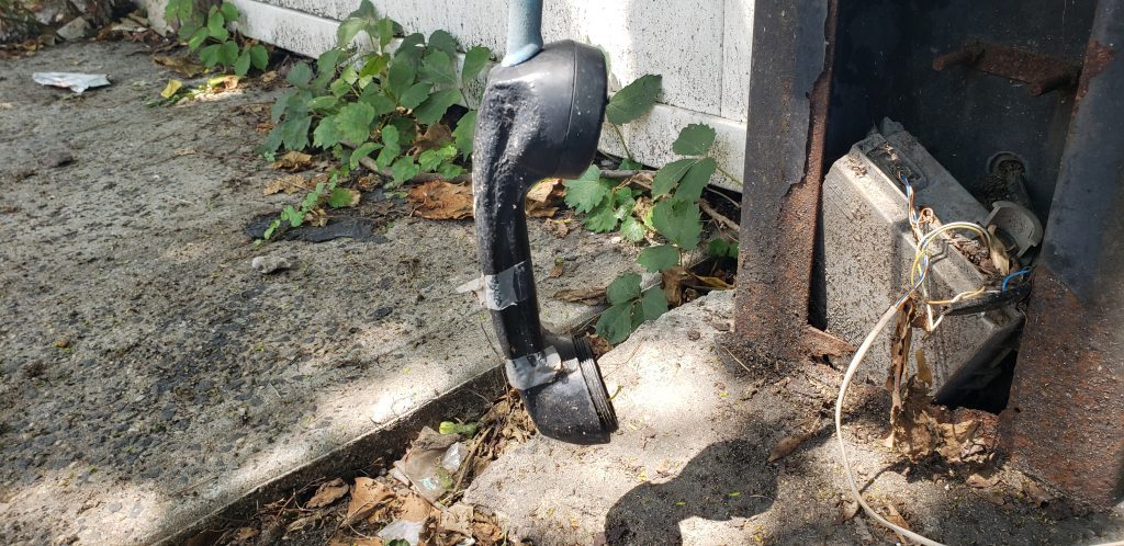 Spider-Webbed Payphone in Gowanus